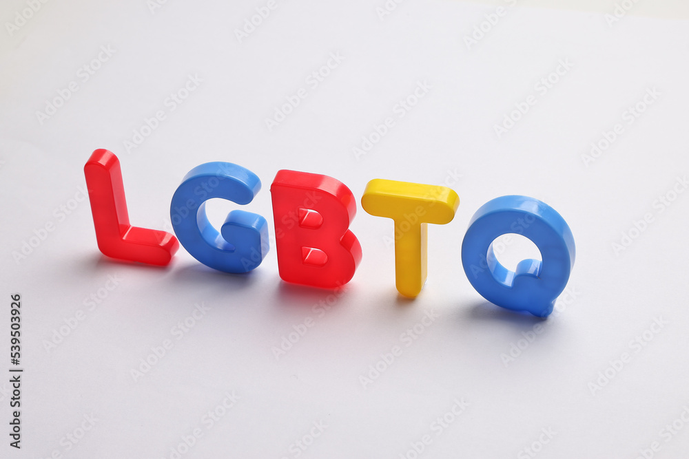 red blue yellow plastic toy capital letter alphabet lgbtq on white background red blue yellow plastic toy capital letter alphabet lgbtq on white background
