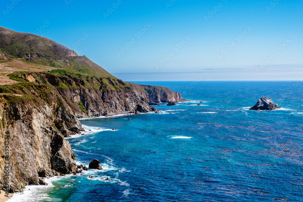 Big Sur, California with Pacific Coast Ocean with mountains Big Sur, California with Pacific Coast Ocean with mountains