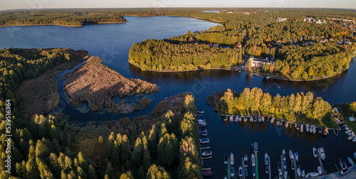 Top view of the Augustow Canal and Lake Necko on an autumn day at sunset.