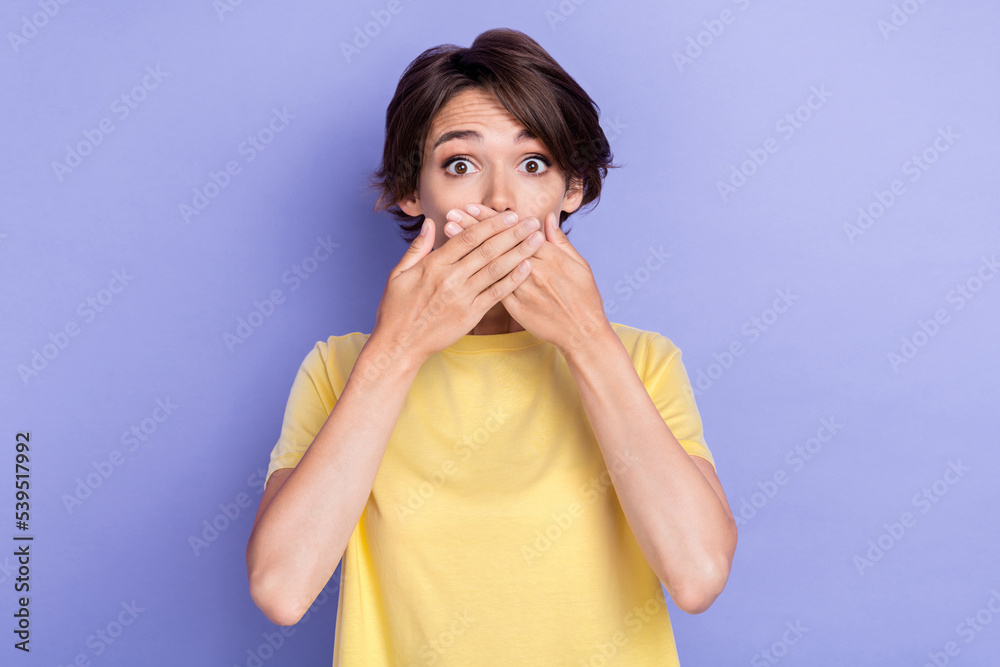 Photo of young attractive gorgeous nice woman lady wear yellow t-shirt closed mouth hands speechless quiet isolated on violet color background Photo of young attractive gorgeous nice woman lady wear yellow t-shirt closed mouth hands speechless quiet isolated on violet color background