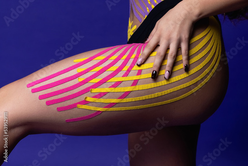 Aesthetic taping for cellulite removal. Cellulite treatment. .Body care modern treatment for tighten skin muscle tissue and improve blood circulation. Anti-cellulite. Sport. Beautiful body.Care.
