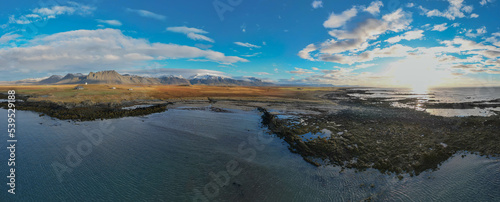 View of the coast line with volcano in the background Snaefellsjohull National Park, Iceland. . 