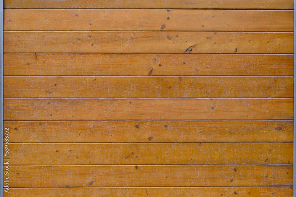 Background. Full frame shot of brown wooden wall. Background. Full frame shot of brown wooden wall.
