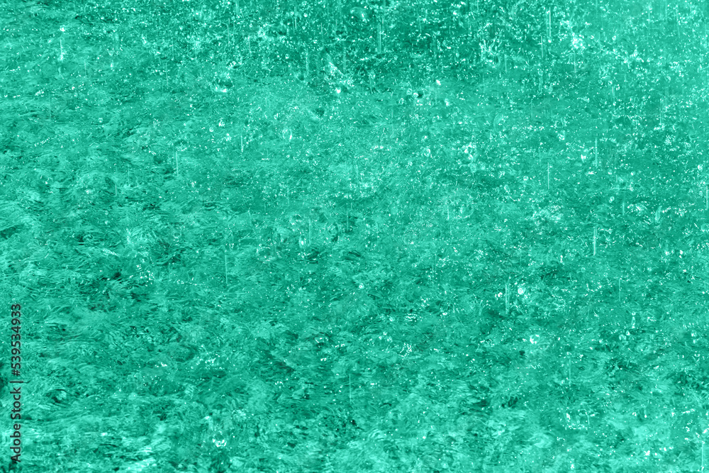 Obraz premium Rain, splashing on water, bubbles