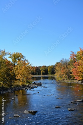 Landscape with river and autumn foliage.