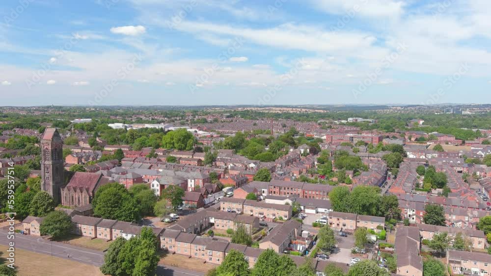 Derby, UK: Aerial view of city in England, suburb with residential houses and greenery - landscape panorama of United Kingdom from above Derby, UK: Aerial view of city in England, suburb with residential houses and greenery - landscape panorama of United Kingdom from above