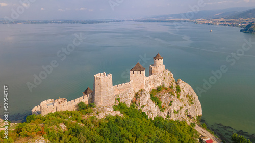 Aerial photography of Golubac fortress located on the Serbian side of the Danube river. Photography was shot from a drone with the Danube river in the background.