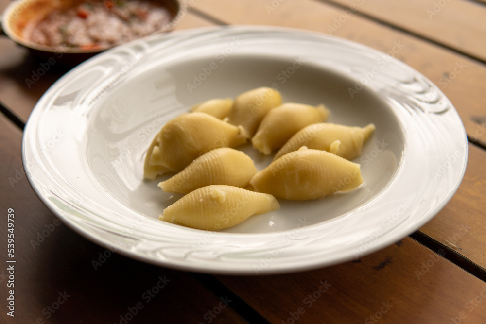 Italian pasta conchiglione without sauce Italian pasta conchiglione without sauce