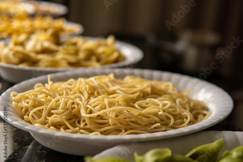 italian spaghetti pasta without sauce with other background pasta
