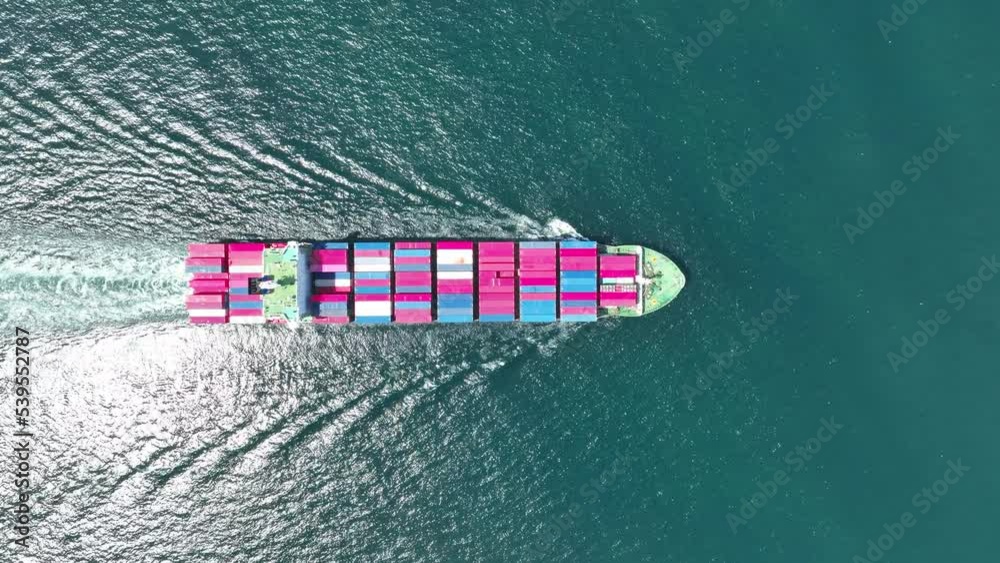 cargo maritime ship with contrail in the ocean ship carrying container ...