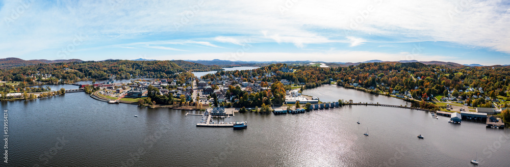 Aerial view of the city of Newport in Vermont from above the lake with autumn colors and leaves