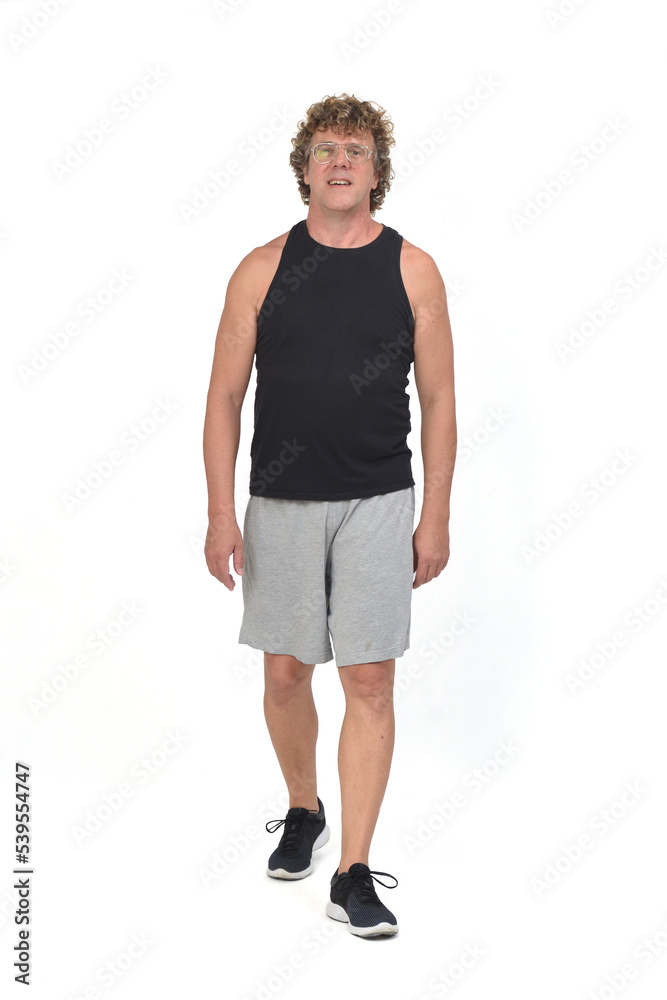 front view of a man with sportswear walking on white background front view of a man with sportswear walking on white background