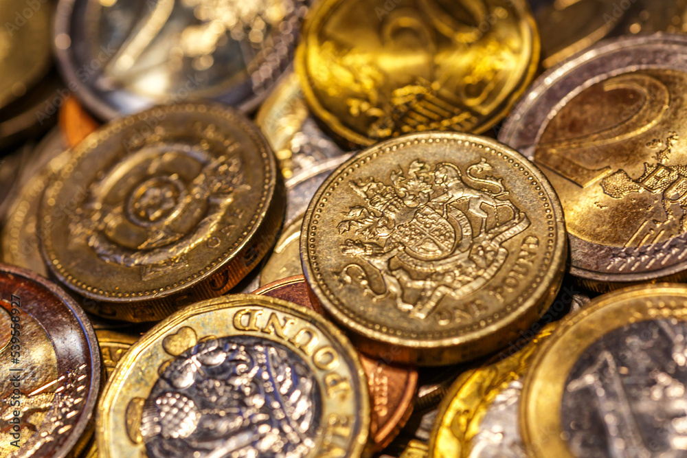 United kingdom Pound coin.British coins stack on black, pound sterling,Business concept.Numismatics. Iron money.Collection