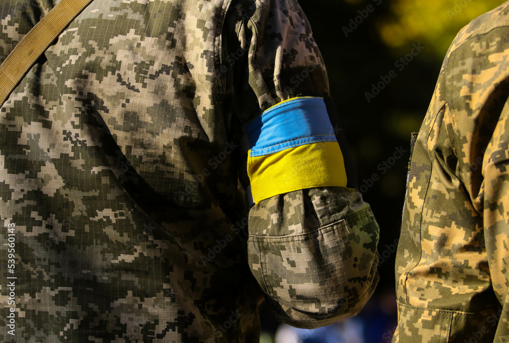 Ukrainian military with a yellow armband Stock Photo Adobe Stock