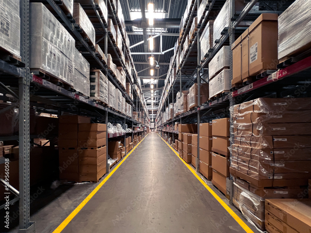 Interior of a modern warehouse storage. Warehouse industrial and logistics companies. Commercial warehouse. Huge distribution warehouse with high shelves