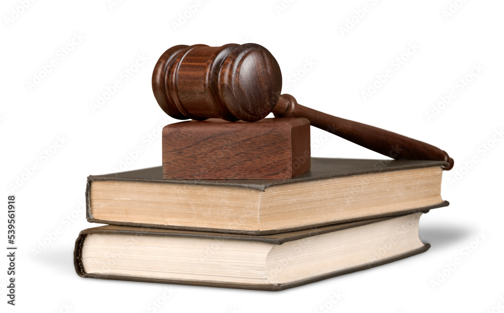 Books and wooden gavel on table. Justice concept Books and wooden gavel on table. Justice concept