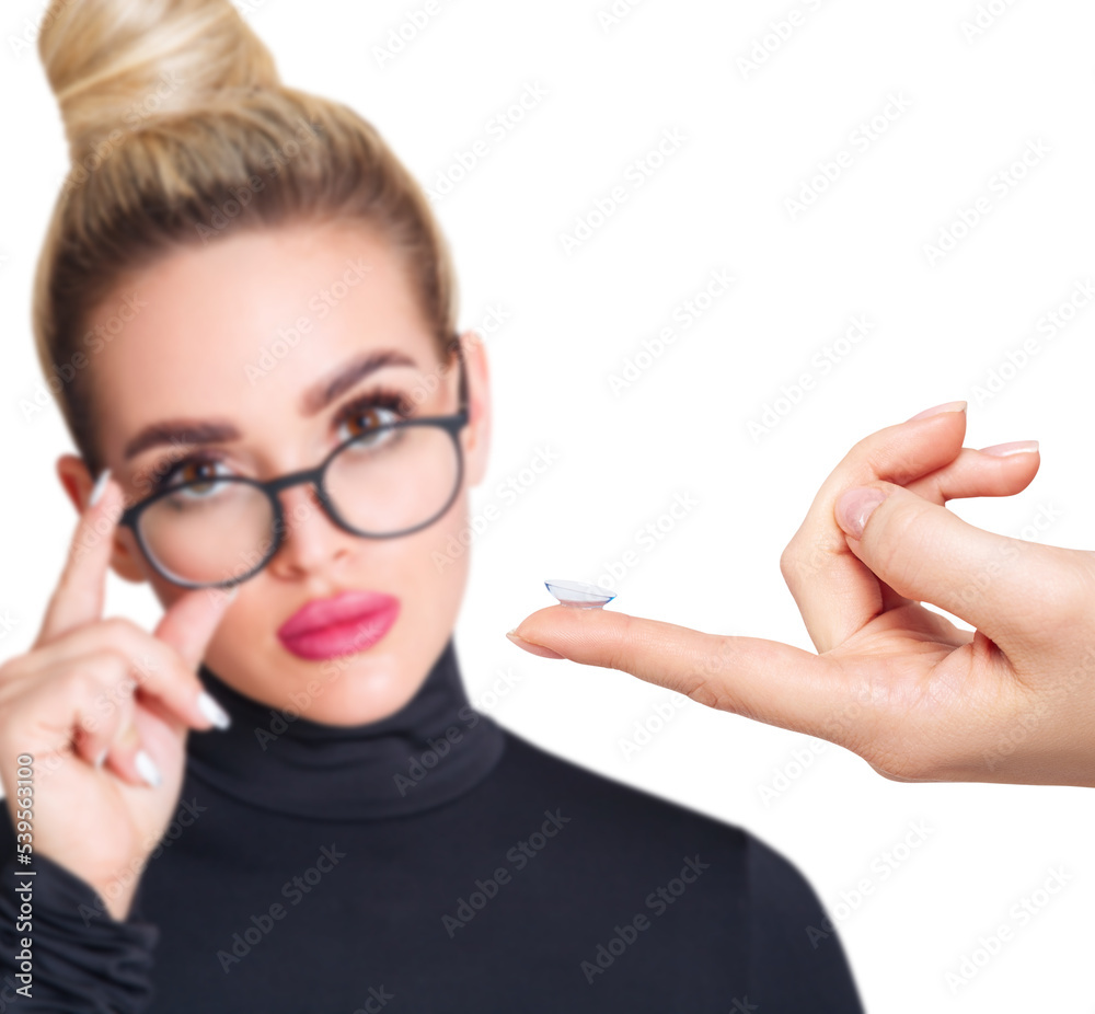 Young woman in glasses decides to wear contact lenses. Young woman in glasses decides to wear contact lenses.