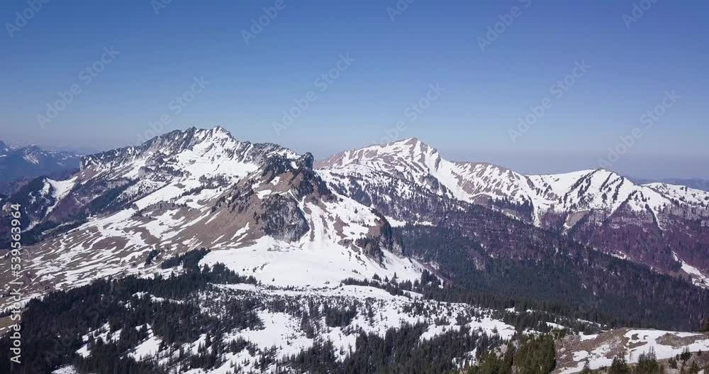 Aerial View of Snowy Mountain in Winter in St. Gallen, Switzerland Aerial View of Snowy Mountain in Winter in St. Gallen, Switzerland
