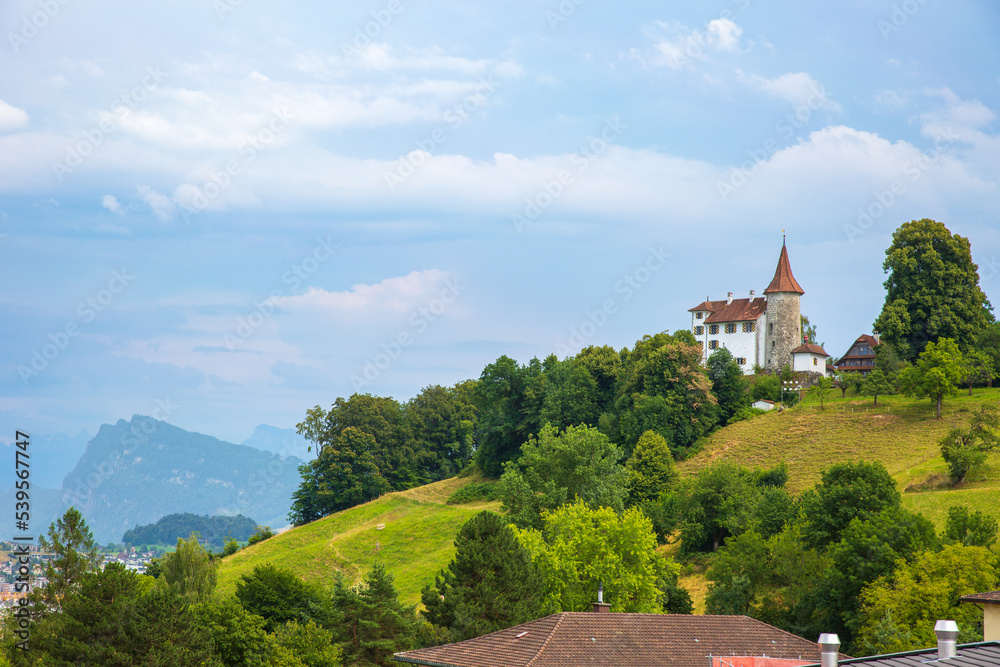 Fototapeta premium Old Schauensee Castle on a hilltop in the city of Kriens (near Luzern and Mount Pilatus), Switzerland