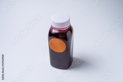 blackcurrant drink in a plastic bottle