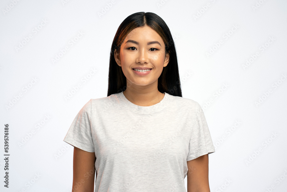 Portrait view of happy woman looking at camera expressing positive emotions Portrait view of happy woman looking at camera expressing positive emotions