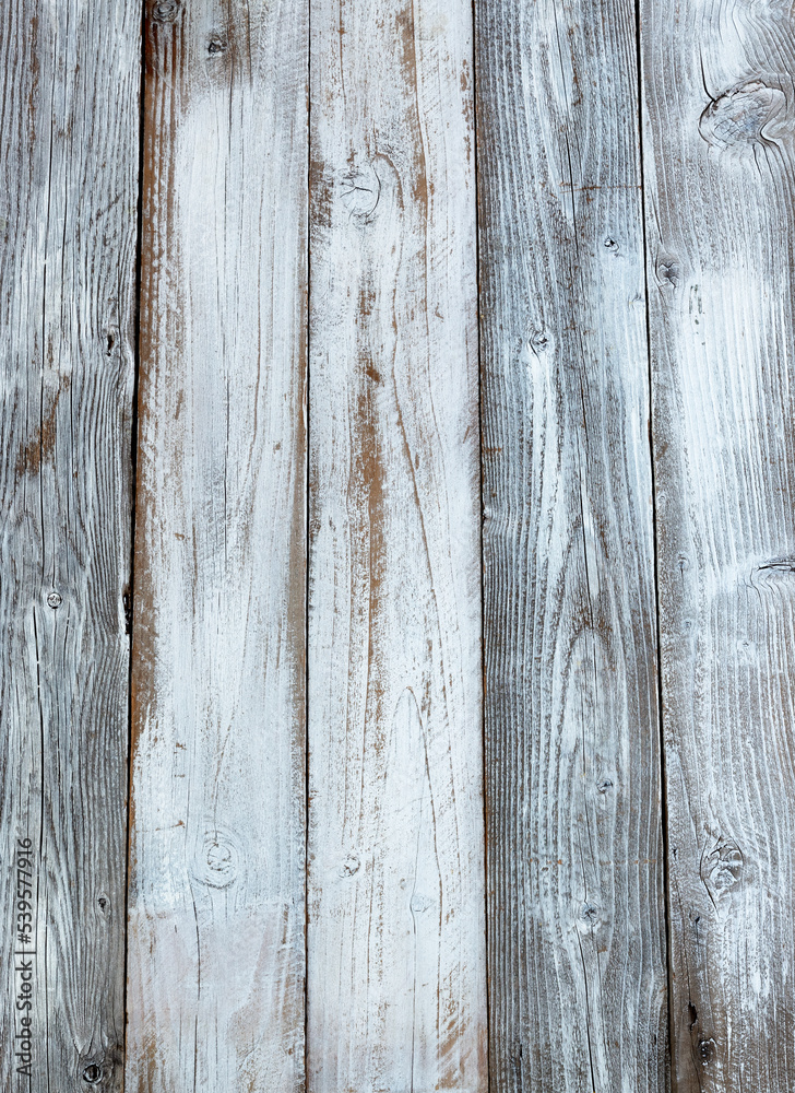 Rustic white painted wooden board background in vertical layout Rustic white painted wooden board background in vertical layout