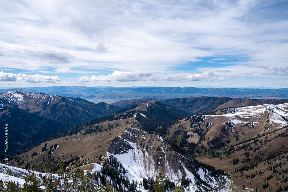Snowy mountain ridges in the Bridger-Teton National Forest of Wyoming, on a summit