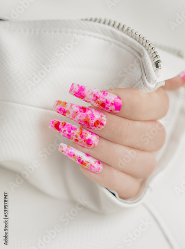 Beautiful stylish pink art manicure on long nails. Art manicure design ideas.