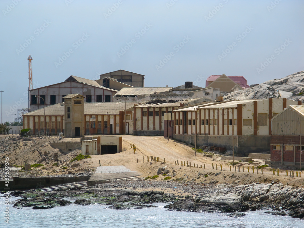 Industrial buildings of Luderitz along the Atlantic Ocean waterfront