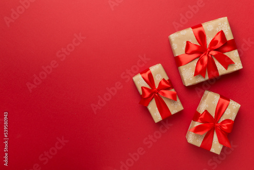 Gift boxes on color background, top view © Liami
