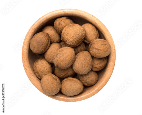 Walnuts with leaves isolated on white, top view