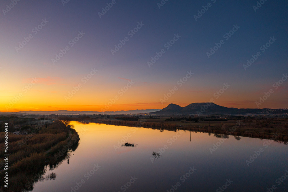 Beautiful reflection of the sky in the river Ter in catalunia spain Beautiful reflection of the sky in the river Ter in catalunia spain