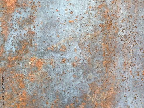 Rusty old iron red scratched metal corrosed sheet surface background, texture industrial in loft style © Aliaksandra