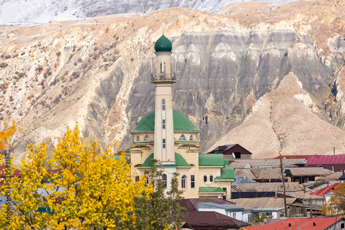 Panoramic view of Salta village, Dagestan, Russia. Mosque and houses in a small mountain village. Minaret on the background of mountains. photo