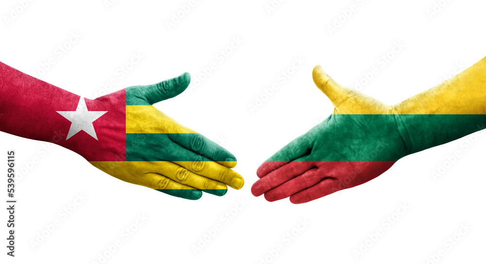 Handshake between Lithuania and Togo flags painted on hands, isolated transparent image.