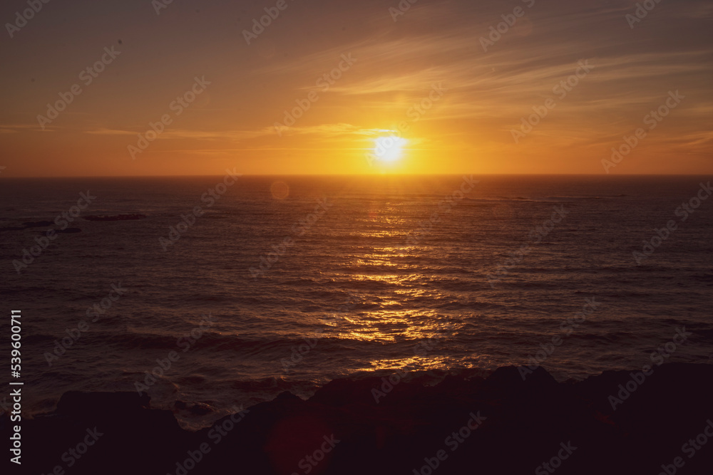 Sun setting over the Oregon Coastline at Devil's Punchbowl Natural Area. Sun setting over the Oregon Coastline at Devil's Punchbowl Natural Area.