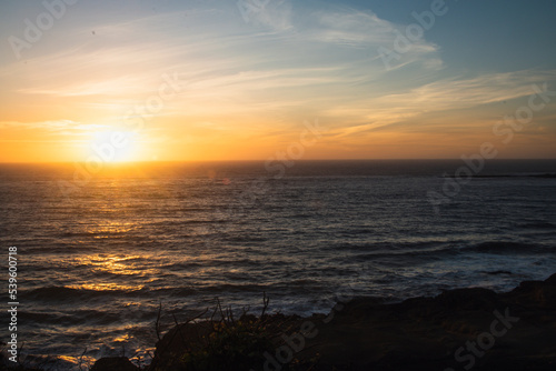 Sun setting over the Oregon Coastline at Devil s Punchbowl Natural Area.  