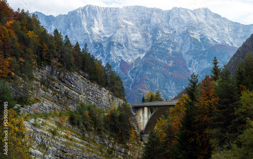 Autumn Colors on Bridge with the Biggest Concrete Arch in Alps - Strmec, Slovenia photo