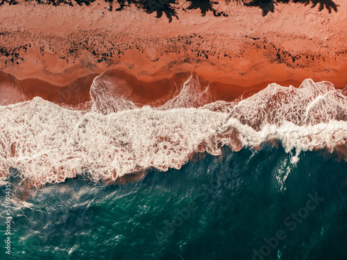 Maunabo beach topdown water aqua blues texture shot on golden hour from the island puerto rico photo