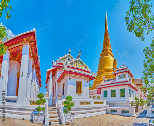 Panorama of Wat Bowonniwet Vihara complex with golden chedi, Bangkok, Thailand photo