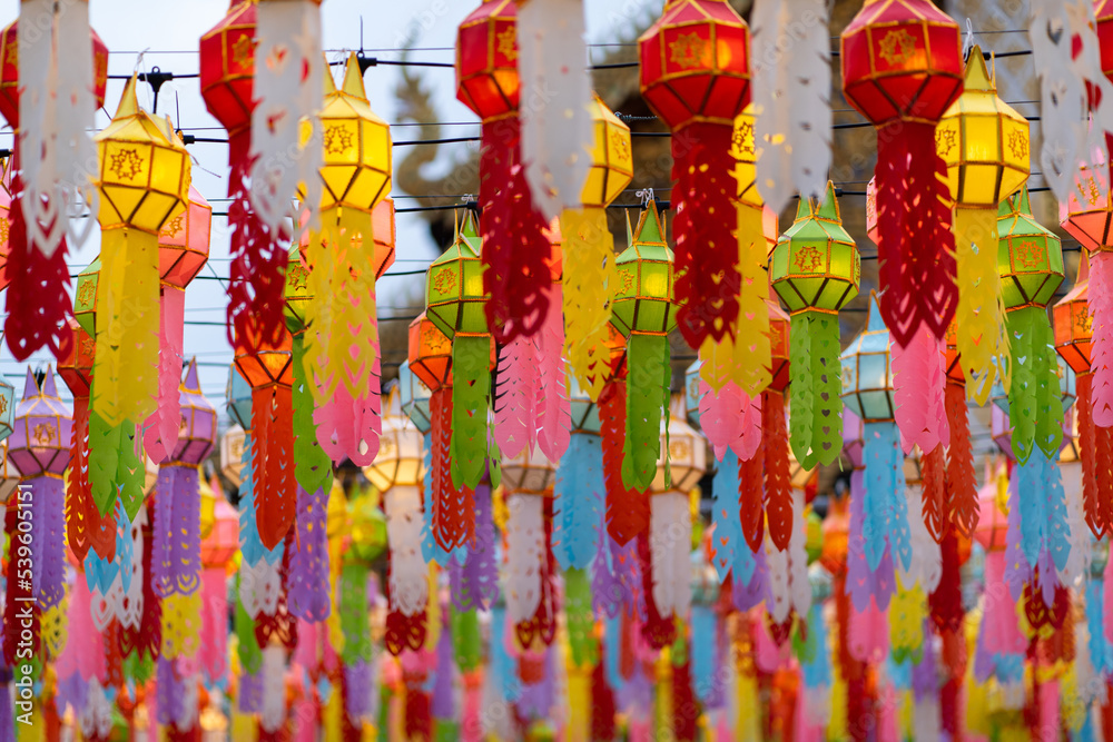 Colorful paper craft lantern festival at Wat Phra That Hariphunchai Lamphun Thailand.