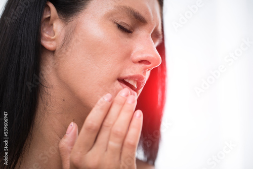Woman pain face. Herpes. Problem face woman.  photo