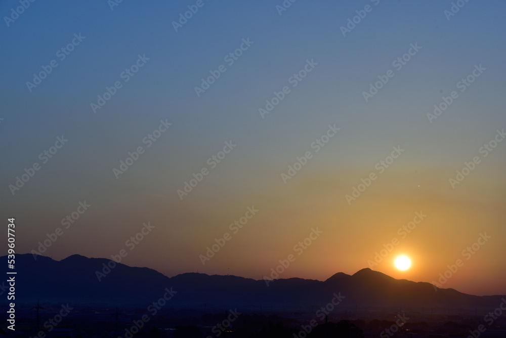sunset over the Mt. Nijo in Nara sunset over the Mt. Nijo in Nara