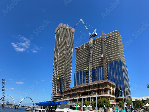 A crane works on high rise construction in Perth Western Australia