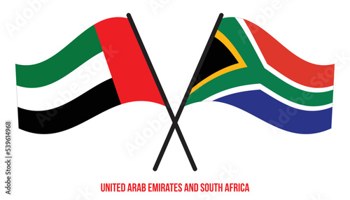United Arab Emirates and South Africa Flags Crossed And Waving Flat Style. Official Proportion.