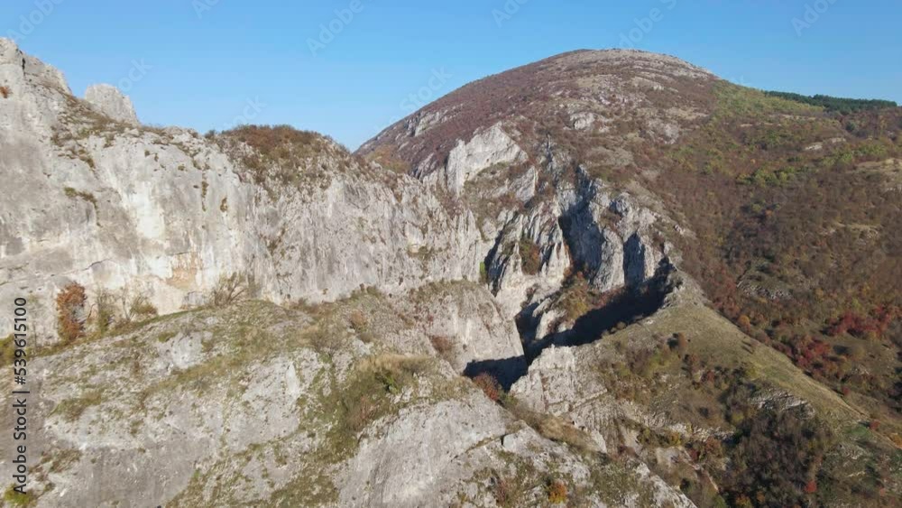 Stone rocks of the Nisevac near Svrljig in Serbia cliff and gorge rock on the mountain range in sunny day Aerial drone video over the hill Stone rocks of the Nisevac near Svrljig in Serbia cliff and gorge rock on the mountain range in sunny day Aerial drone video over the hill