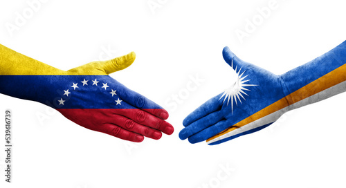 Handshake between Marshall Islands and Venezuela flags painted on hands, isolated transparent image.
