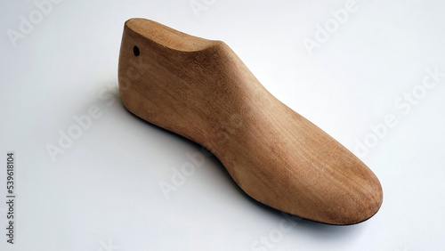 Old wooden shoe shape used by shoemakers in the manufacture of adult and children's shoes. Modeling.
