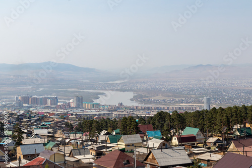 View of the city of Ulan-Ude and the Selenga River from the mountain.Russia, Ulan-Ude, May 12, 2022 photo