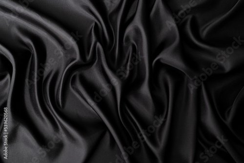 Close up of black silk background